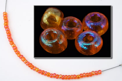 91030- Tr. Light Orange Iris Czech Seed Beads