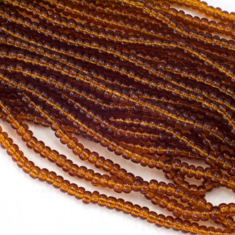 10140- Transparent Mahogany Czech Seed Beads
