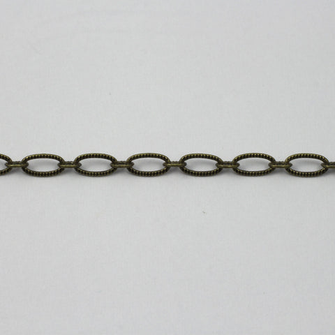 Antique Brass 6.4mm x 3mm Textured Oval Chain CC174-General Bead