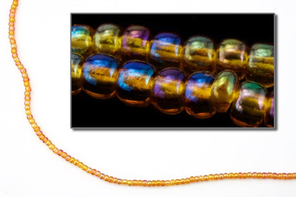 11070- Transparent Rust Iris Czech Seed Beads