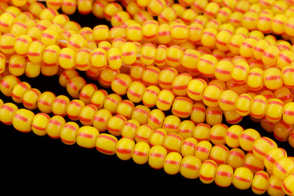83970- Opaque Yellow/Red Stripe Czech Seed Bead