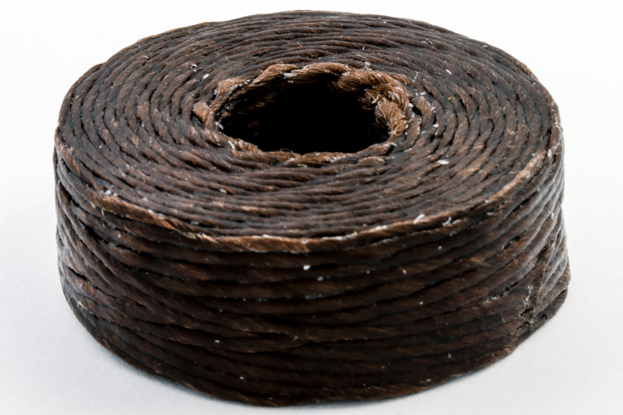Artificial sinew, waxed flat lacing, 1/2 lb spool - Track of the Wolf