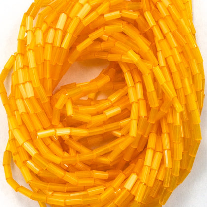 Size 2 Satin Tangerine Bugle (10 Gm, Hank, 1/2 Kilo) #CBB020-General Bead