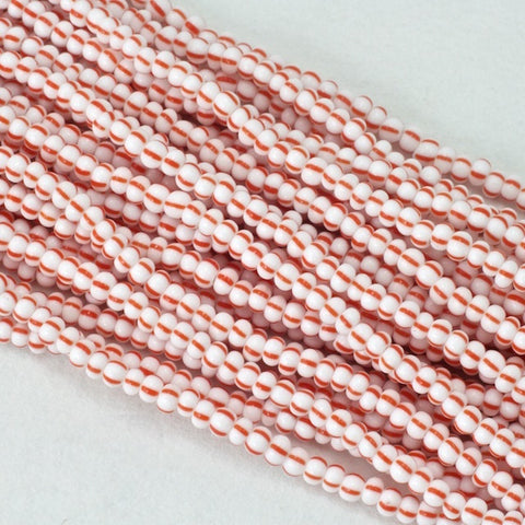 8/0 Opaque White/Red Stripe Czech Seed Bead (20 Gm, 1/2 Kilo) #CSD107