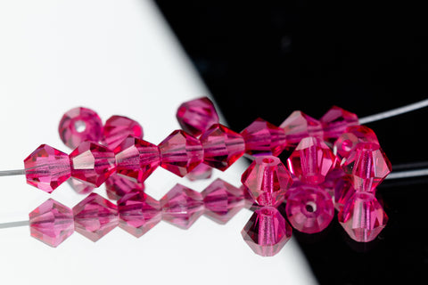 5mm Transparent Fuchsia Faceted Crystal Bicone #GDQ022