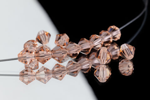 5mm Transparent Light Peach Faceted Crystal Bicone #GDQ030