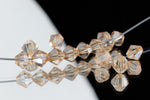 5mm Light Topaz Luster Faceted Crystal Bicone #GDQ040