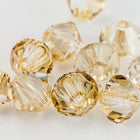 Swarovski 5301 Golden Shadow Bicone-General Bead